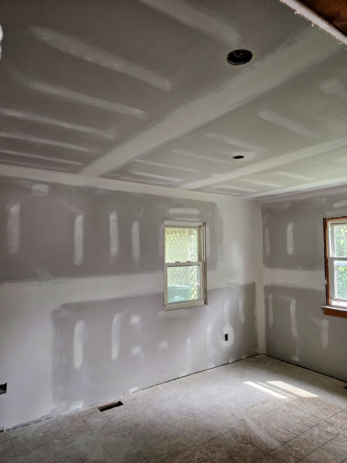 Drywall installation completed and ready for primer by TDM Drywall