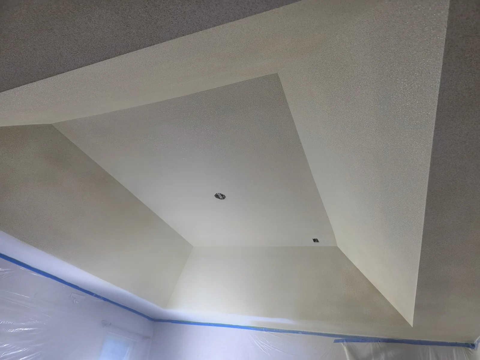 Finished sprayed-texture tray ceiling completed by TDM Drywall in Carleton, MI