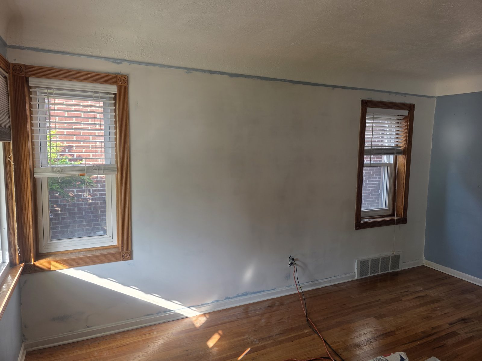 Bedroom walls patched and refinished by TDM Drywall in Trenton, MI